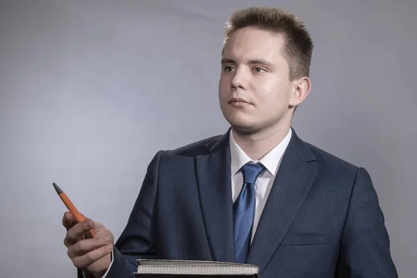 Portrait Young Man Suit Tie Pencil Notepad His Hand May — Stock Photo, Image