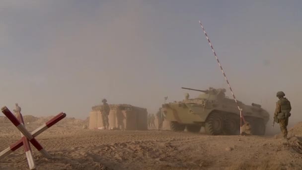 Military Heavy Armored Vehicles Leave Russian Checkpoint Combat Operation Desert — Stock Video