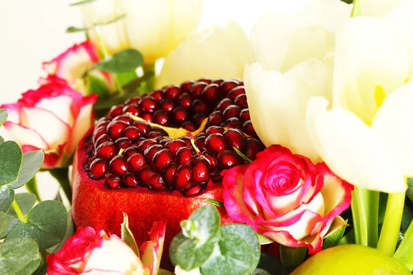 Bouquet with fruit and flowers