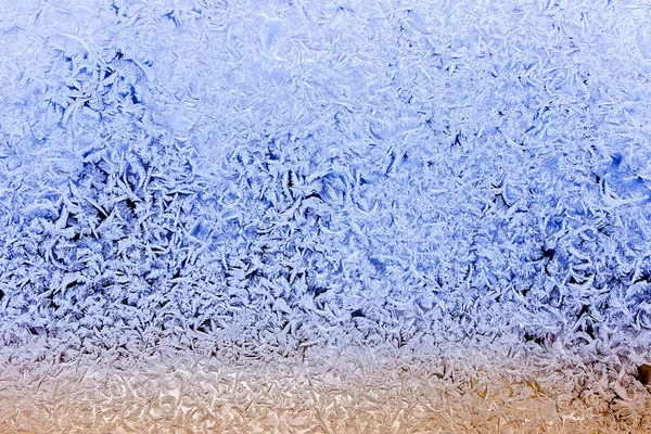 Frost patterns on window — Stock Photo, Image