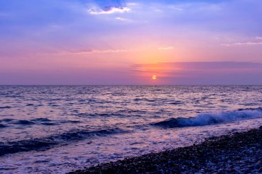 Beautiful sea sunset with pink colors. Summer landscape.
