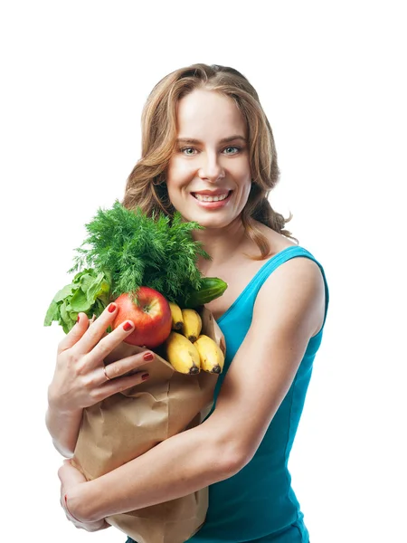 Mulher segurando um saco com alimentos orgânicos — Fotografia de Stock