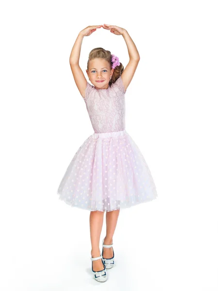 Pequeña bailarina en un hermoso vestido rosa — Foto de Stock