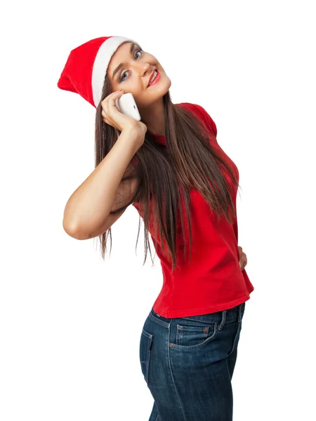 Femme souriante dans santa chapeau d'aide parle par téléphone — Photo