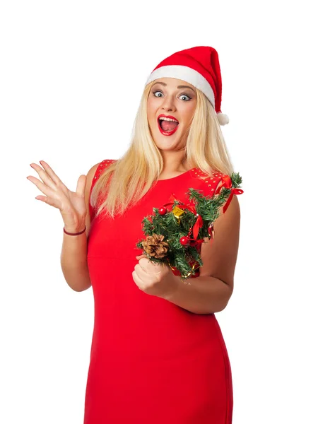 Mooi meisje in een rode jurk die houden van een kerstboom — Stockfoto