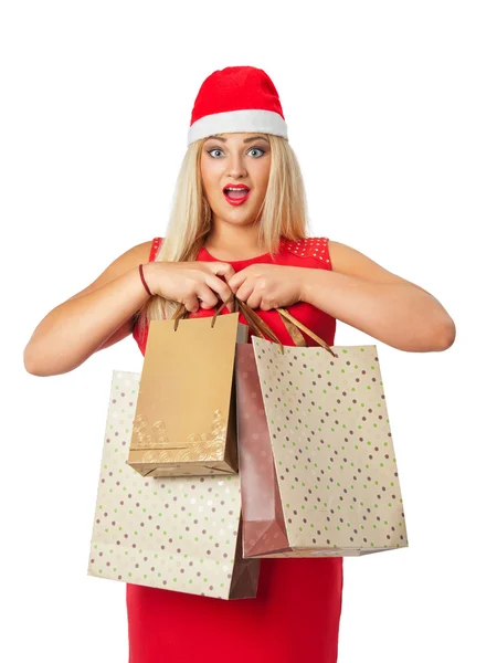 Blondine im Weihnachtsanzug mit Einkaufstasche — Stockfoto