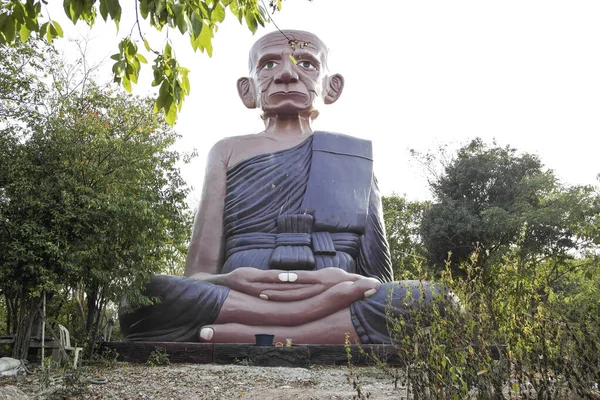 Statue of a sitting Buddha in an Asian country