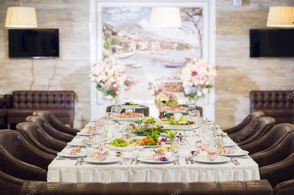 Beautifully organized event - served banquet table ready for guests