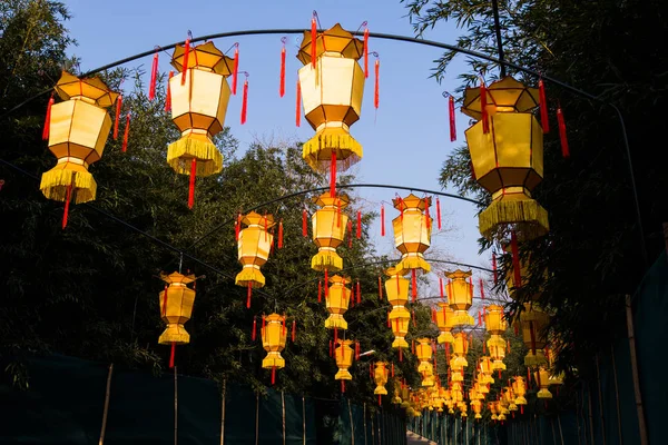 Yellow chinese lantern with messages wishing good luck, health, peace and prosperity