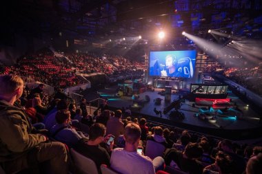 SAINT PETERSBURG, RUSSIA - OCTOBER 28 2017: EPICENTER Counter Strike: Global Offensive cyber sport event. Main venue stage and the screen with live picture from the game clipart