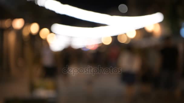 Abstrakcyjny obraz nocnego festiwalu na ulicznym tle z bokeh. — Wideo stockowe