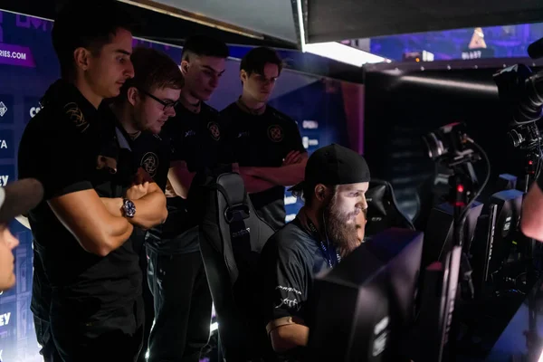 MOSCOW, RUSSIA - 14th SEPTEMBER 2019: esports Counter-Strike: Global Offensive event. Players booth with team Ninjas in Pyjamas legend player Patrik f0rest Lindberg inside on a stage having fun. — Stock Photo, Image