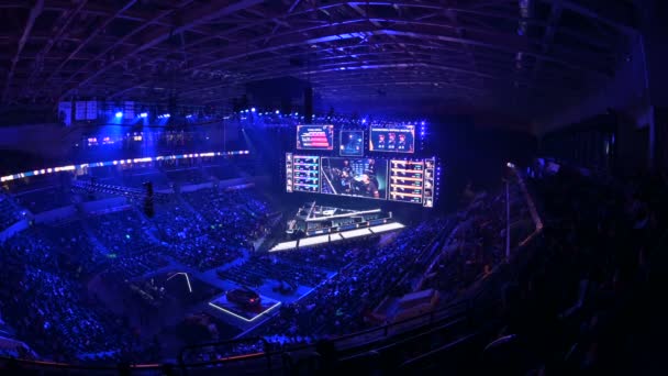 MOSCOW, RUSSIA - 14th SEPTEMBER 2019: esports Counter-Strike: Global Offensive event. Main stage with a big screen showing the matchs game moments. Arena lit with a blue color. — Stock Video