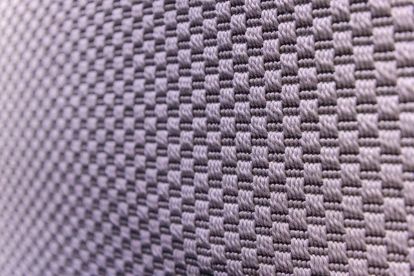 Light purple background of dense woven bagging fabric, closeup. Structure of the cloth with natural texture. Cloth backdrop. — Stock Photo, Image