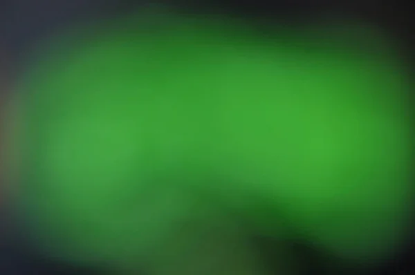 Solid green blurred background texture illustration with darkeni