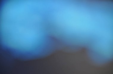 Pastel mavi düz basit karanlık bulanık spot arka plan doku hasta