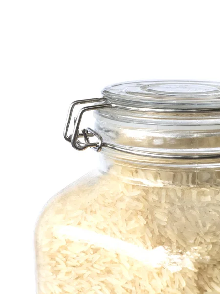 Cerrar el arroz en el frasco de vidrio, aislado en blanco — Foto de Stock