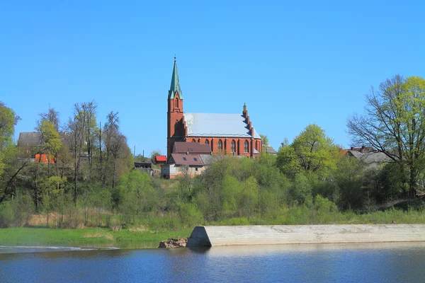 Lutheran church on the river bank to Sheshupa — Stock Photo, Image