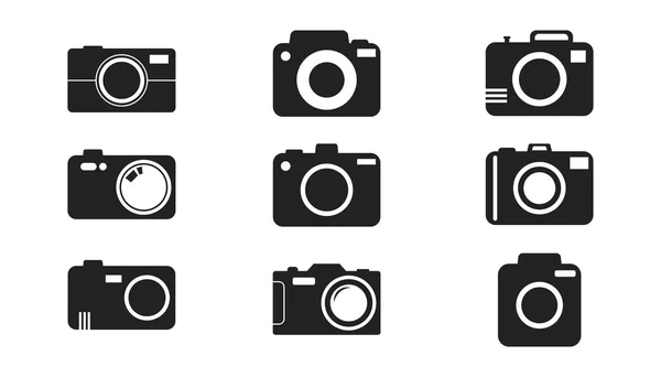 Icono de la cámara sobre fondo blanco. Ilustración vectorial en estilo plano con iconos de fotografía . — Vector de stock