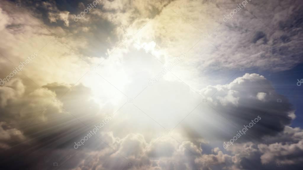  God rays .  Dramatic nature background .  Sunset or sunrise with clouds, light rays and other atmospheric effect . Light from sky . Religion background .
