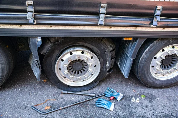 Truck wheel. Repair of cars on the road. Change wheel