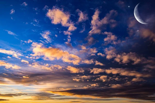 Moon Clouds Skies . White moon over stormy clouds . Dramatic nature background . Full moon background . landscape  . Young month in night sky