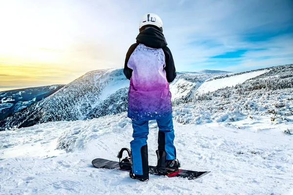 Snowboarding woman   . sport clothes . winter sport . at mountain top