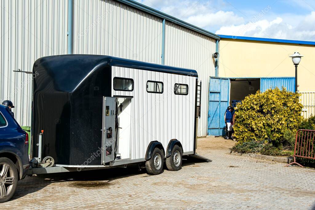 horse vehicle .  Carriage for horses . Auto trailer for transportation of horses . transportation livestock . Horse transportation van , equestrian 