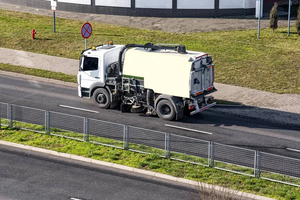 Community street cleaners . Street sweeper vehicle