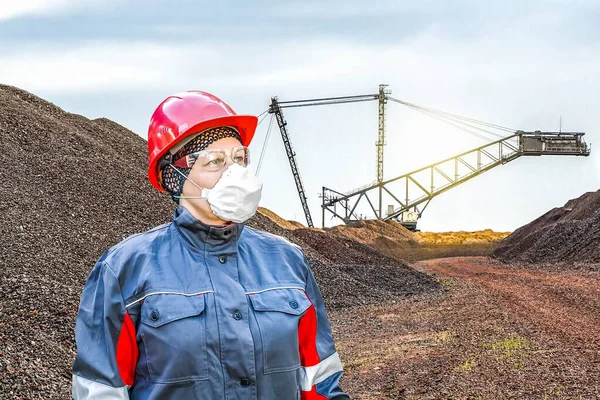 labor protection. Female hard work. harmful production. Work clothes, vest and helmet.