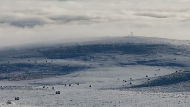 The formation and movements of clouds up to the steep slopes of the  mountains of Central Caucasus peaks. — Stock Video