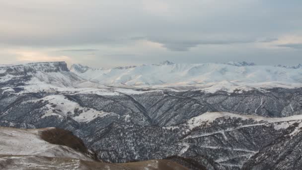 The formation and movements of clouds up to the steep slopes of the  mountains of Central Caucasus peaks. — Stock Video