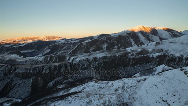 The formation and movements of clouds up to the steep slopes of the  mountains of Central Caucasus peaks. — Stock Video