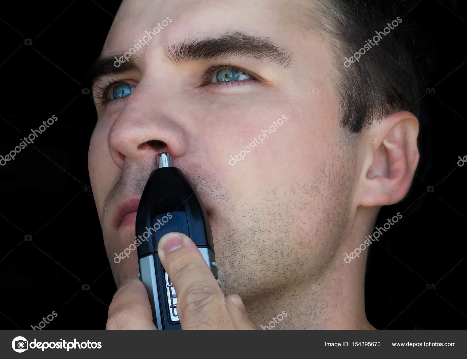 Man using nose hair trimmer — Stock Photo © diy13ya.ru 154395670