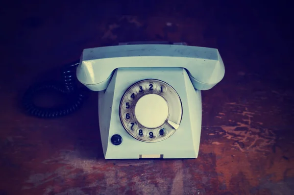 Retro background with rotary telephone