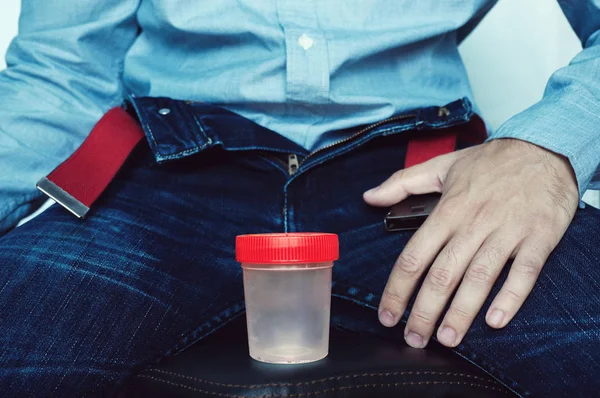 Empty plastic container for testing semen or urine — Stock Photo, Image