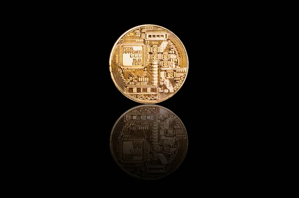 Golden bitcoin on black background