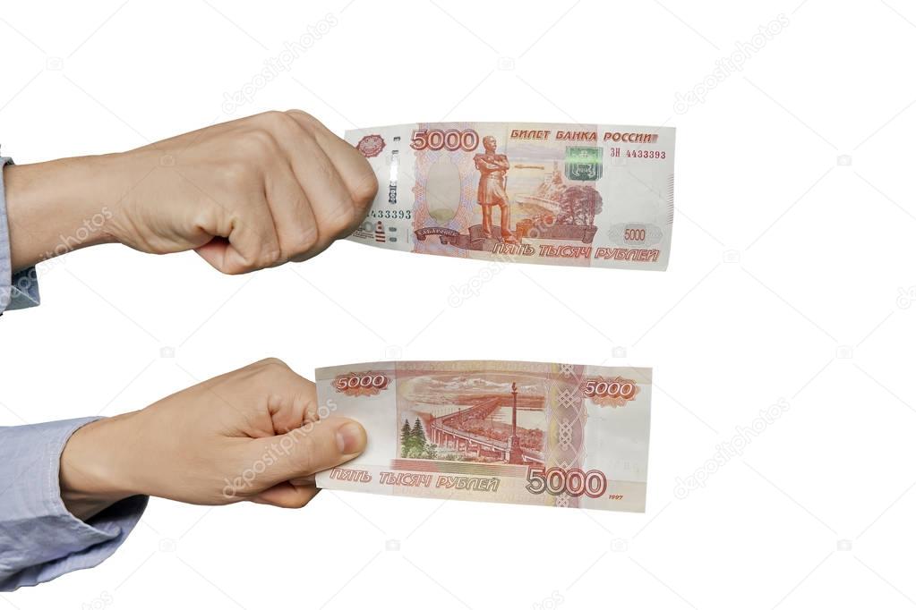 Russian banknote 5000 rubles in men hand on white background