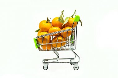 small shopping cart with many clementines and tangerines clipart