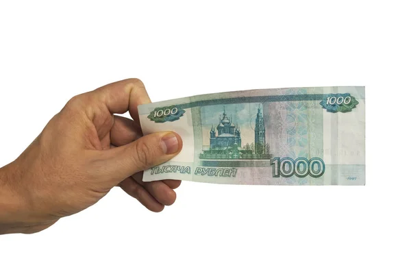 Рука дає банкноти рублів — стокове фото