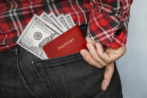 Passport in the back jeans pocket