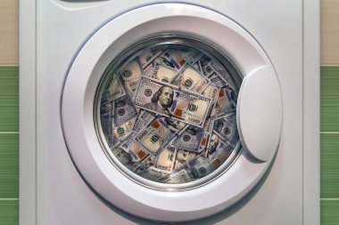 money in washing machine close up clipart