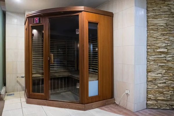 A small wooden infrarered sauna booth in a spa — Stock Photo, Image