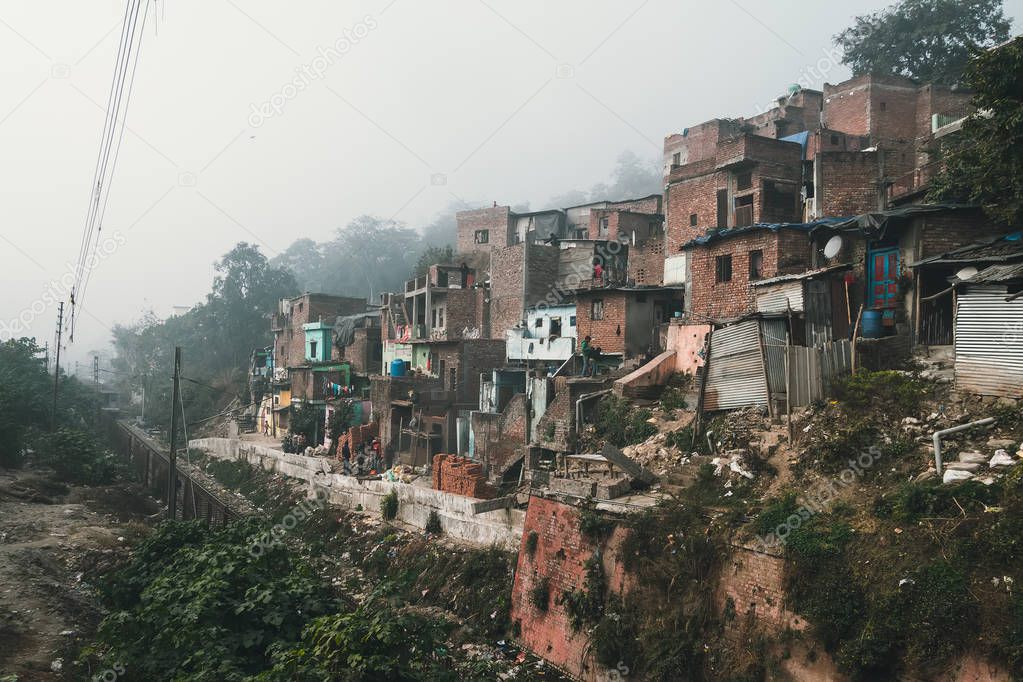 old dirty houses in the slums quarter in Haridwar, India.