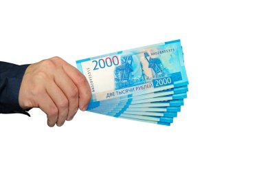 Rus banknotlar ruble yığın adam elinde