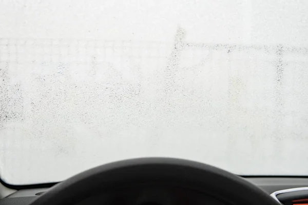 Frost on the windshield of the car. View from the driver's side — Stock Photo, Image