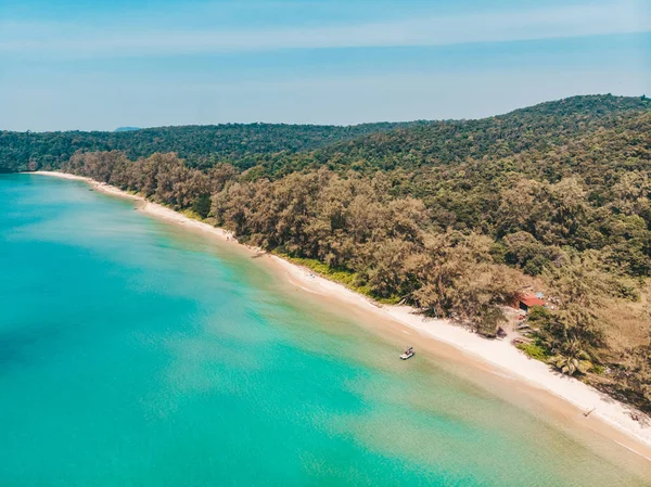 Long deserted beach with white sand and clear water. Aerial top view. Coast of island Koh Rong Samloem, Cambodia