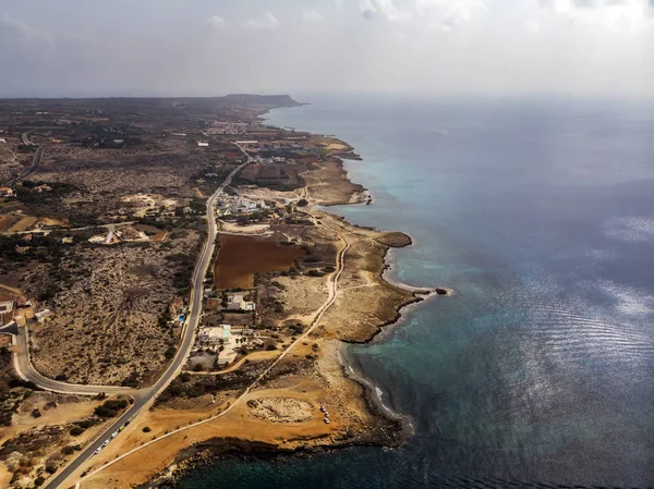 Sandy Nissi Beach of Famagusta district of Aia Napa Cyprus. Aerial View Beach of Cyprus Mediterranean Holiday Vacation Sea Life. Top View of Beach Coastal Strip on a Sunny Summer Day — Stock Photo, Image