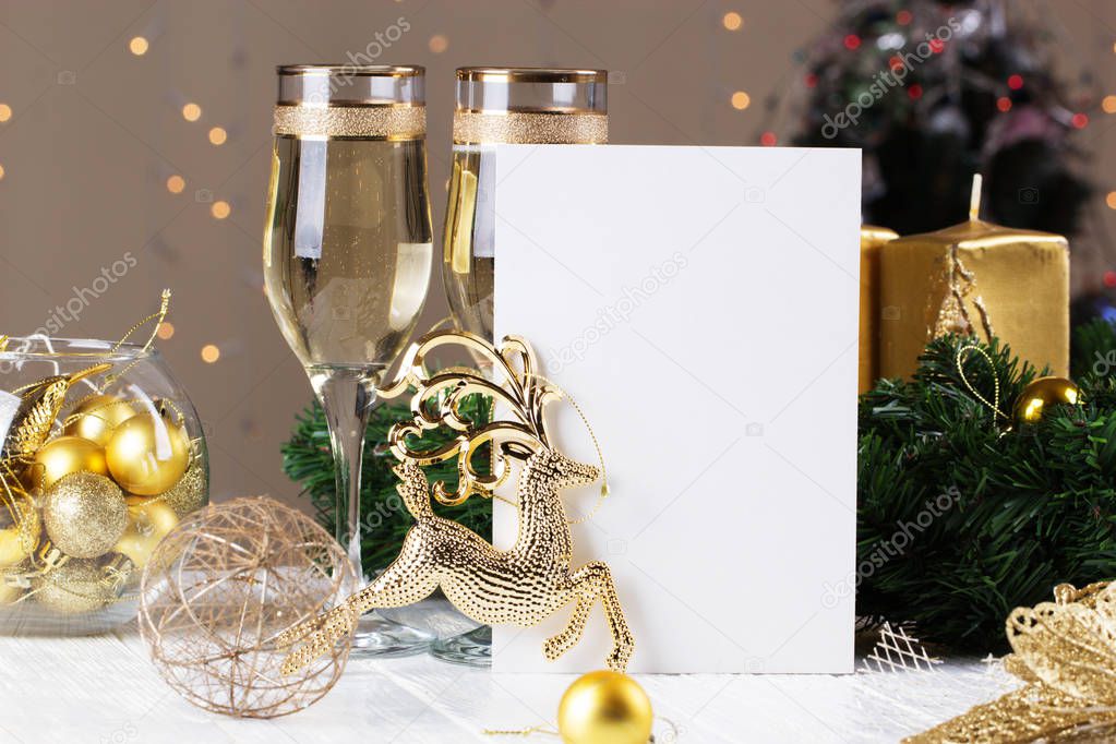 Champagne glasses with paper note card