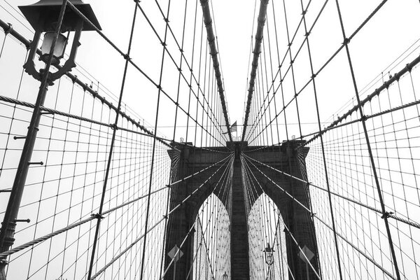 Brooklyn Bridge against sky black and white, New York City, USA